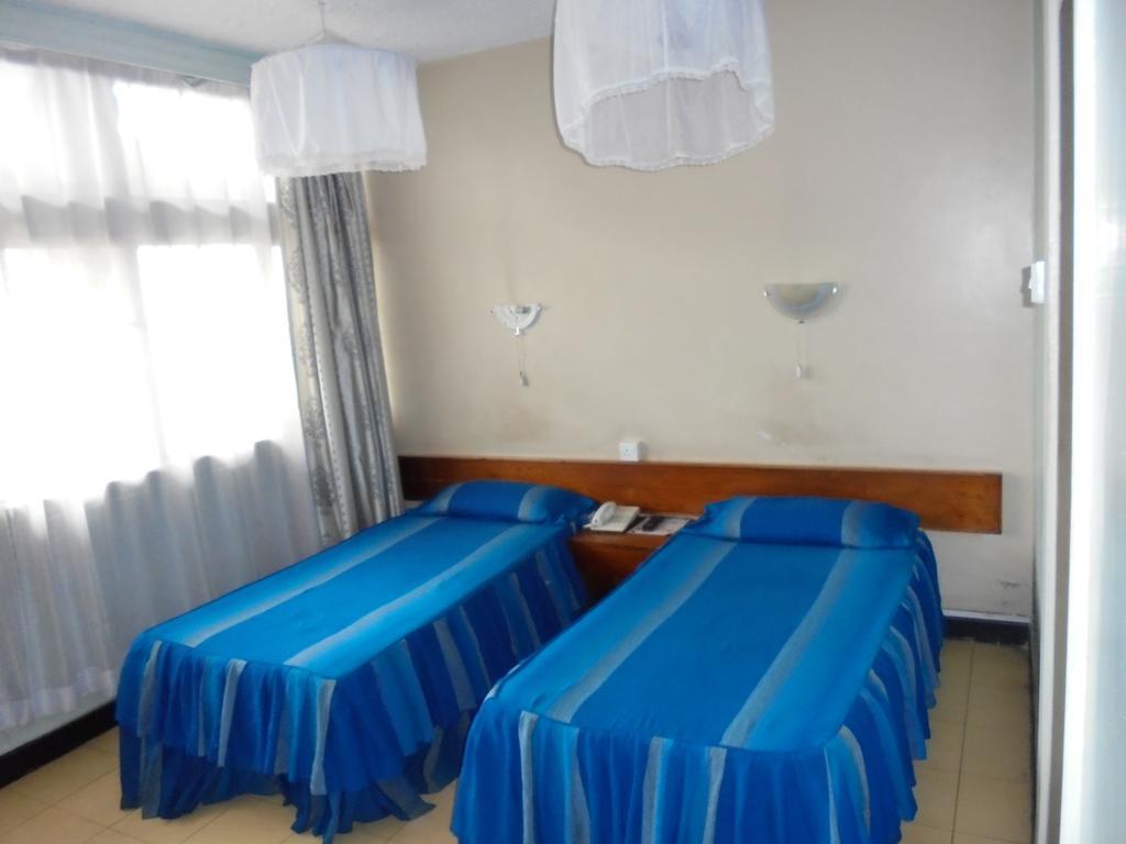 Karibu Hotel Найробі Номер фото