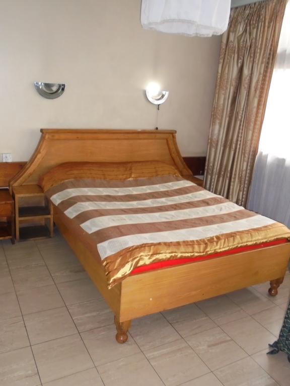 Karibu Hotel Найробі Номер фото