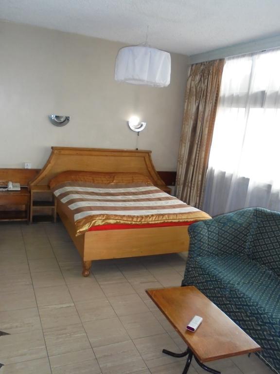 Karibu Hotel Найробі Номер фото